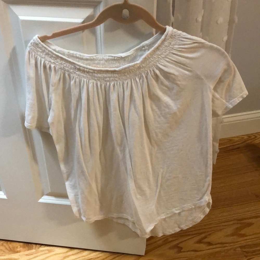 Off the shoulder white blouse.